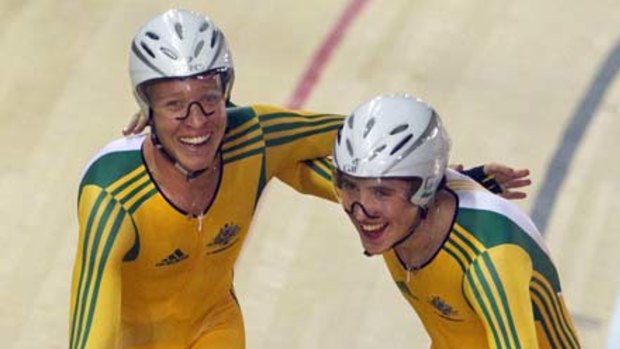 Dale Parker (right) with Cameron Meyer after winning gold in the team pursuit in Delhi.