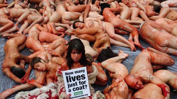 Animal rights activists AnimaNaturalis stage a naked protest against fur in Barcelona.