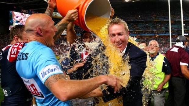 Trent Robinson is drenched after winning the 2013 NRL grand final.