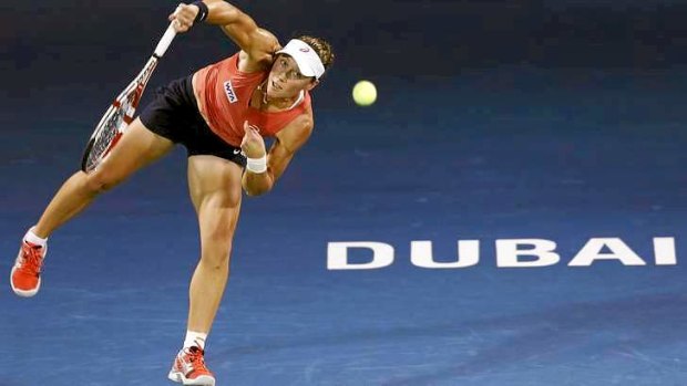 Samantha Stosur of Australia serves to Ekaterina Makarova WTA Dubai Tennis Championships.