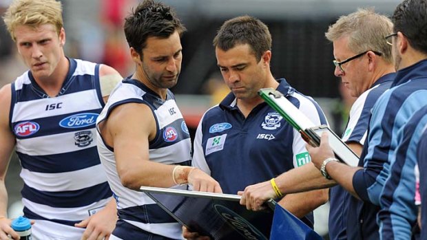 Geelong's Jimmy Bartel with coach Chris Scott at the MCG.
