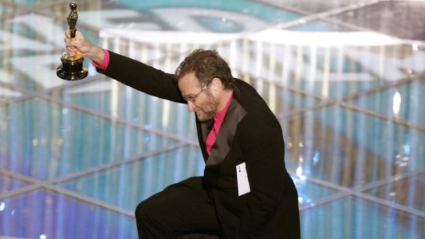 Robin Williams prepares to present the Oscar for best animated feature at the Academy Awards in 2005.