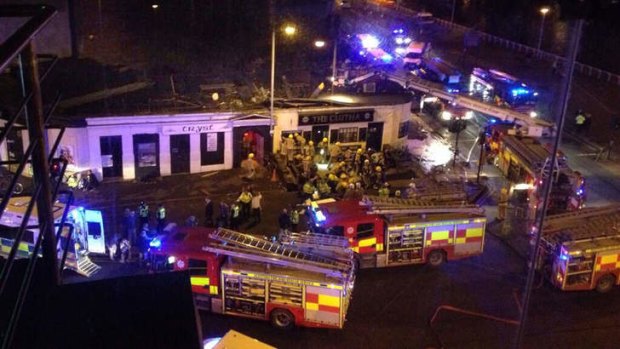 Picture taken with permission from Jan Hollands Twitter feed JanHollands@Janney_h of the helicopter crash at the Clutha Bar in Glasgow.