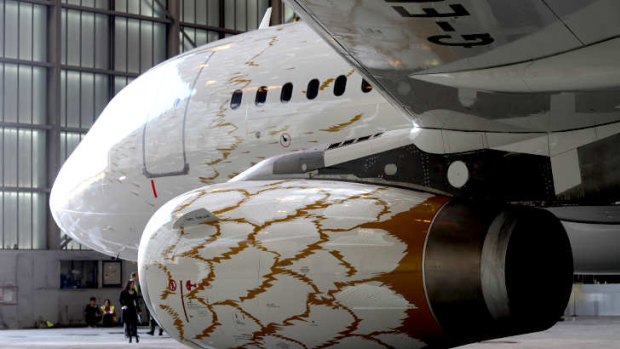 British Airways has unveiled the first of nine planes specially painted to look like golden doves to mark the London 2012 Olympic Games.