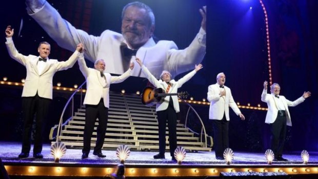 From left: Michael Palin, Terry Gilliam, Eric Idle, John Cleese and Terry Jones on stage during the opening night of <i>Monty Python Live (Mostly)</i>.