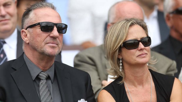 Sir Ian Botham and wife, Kathy at the service for Tony Greig.