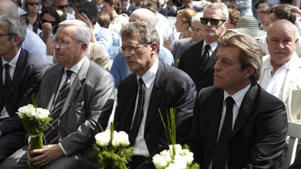 In mourning...Alain Joyandet, the French Secretary of State for Co-operation, right, at the service in Rio de Janeiro