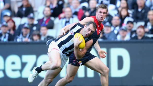 Under pressure: Travis Cloke and the Pies are in the gun.