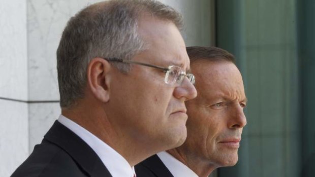 Prime Minister Tony Abbott and Immigration Minister Scott Morrison during a press conference.