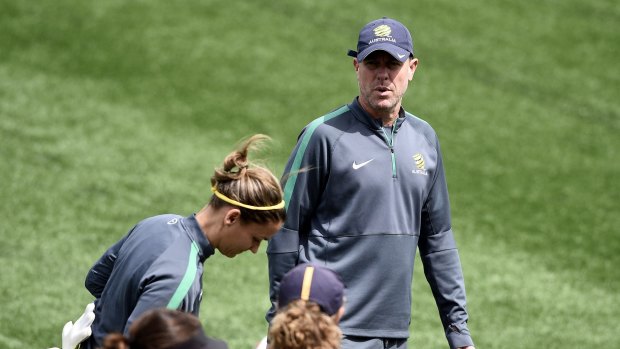In charge: Matildas head coach Alen Stajcic (centre) has drawn on his experiences as a teacher to help get the best out of his team.