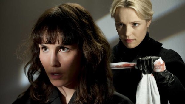 Gag order:  Noomi Rapace (left)  and Rachel McAdams in <i>Passion</i>.