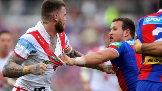 Brouhaha: Josh Dugan of the Dragons and Newcastle's Tyrone Roberts let loose at Hunter Stadium.