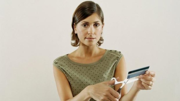 Cut it out: Get rid of your credit card debt in one easy snip.