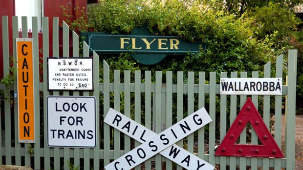 History express ... old train signs line the fence of Carriageway at Crooks Park Estate.