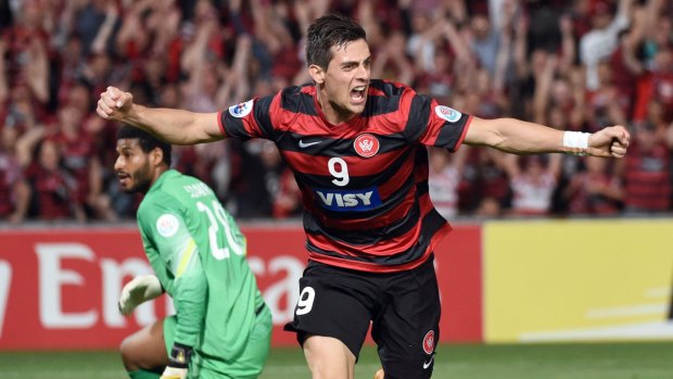 Tomi Juric celebrates a goal against Saudi Arabia's Al Hilal in the first leg of the AFC Champions League football final in Sydney.