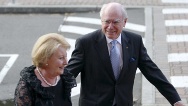 Unlikely praise ... Janette and John Howard.