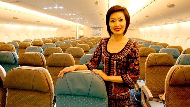 Impeccably groomed ... the famed "Singapore Girl" cabin crew of Singapore Airlines.