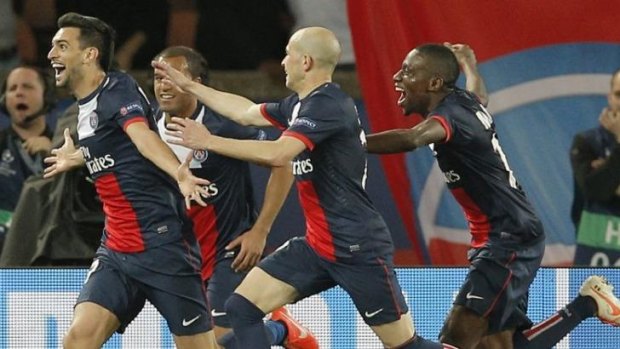 Javier Pastore, left, celebrates after scoring PSG's crucial third goal.