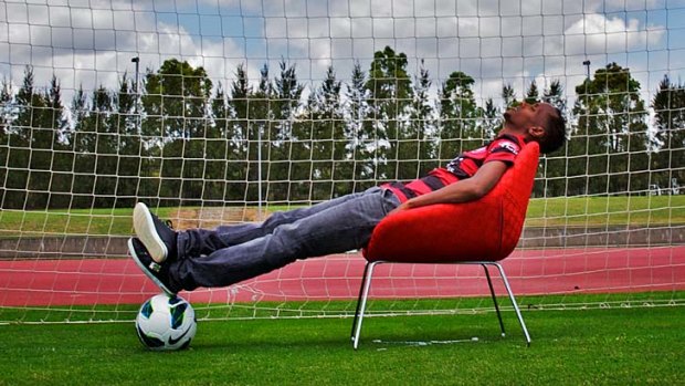 Feet up ... Youssouf Hersi's many sacrifices are starting to pay off.