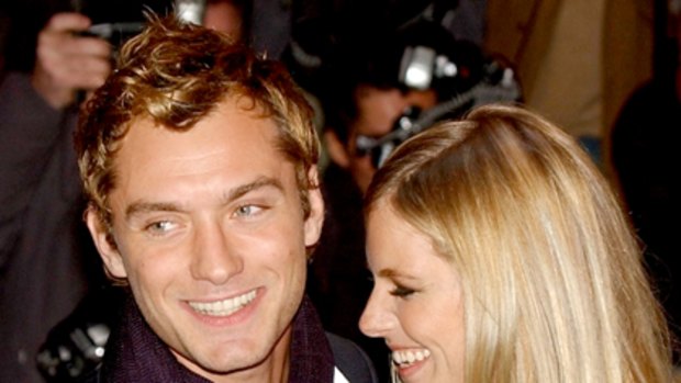 Golden couple reunite ... Jude Law and Sienna Miller.