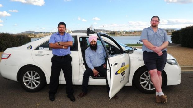 Canberra taxi drivers from left,  Amit Khajuria, Gurtejwar Sing and Daniel Van de Zandt.