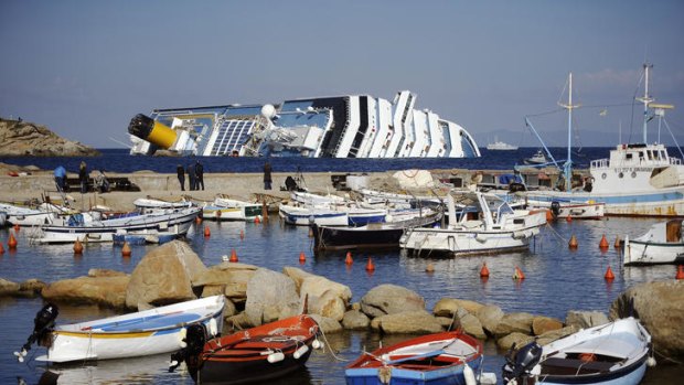 The stricken Costa Concordia  aground off the coast of the Italian island of Giglio.