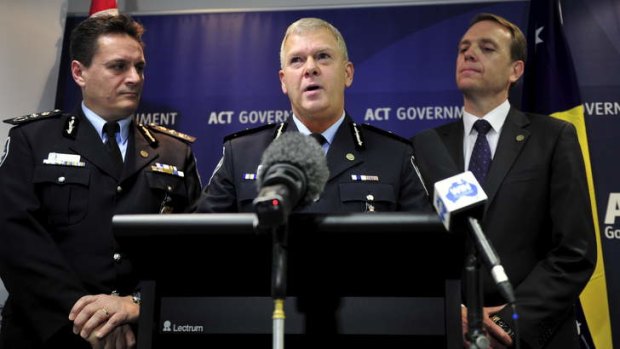 Top cop ... New ACT Chief Police Officer Rudi Lammers, centre, with AFP Commissioner Tony Negus and Police Minister Simon Corbell.