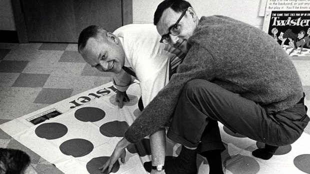 Co-inventors of the game Twister Charles Foley, left, and Neil Rabens demonstrate the game.