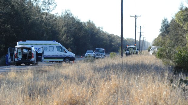 Crime scene: Police block off the road at Talga Lane on the Newell Highway at Croppa Creek last week.