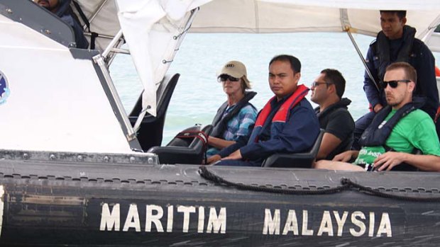Rod and the other participants spend time with the Malaysian Maritime Enforcement Agency, patrolling the waters for illegal immigrants.