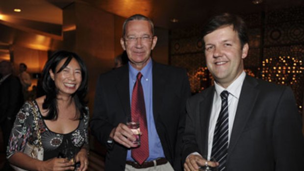 The Age journalist Mary- Anne Toy with journalist of the year Gary Hughes (centre) and Ewin Hannan.