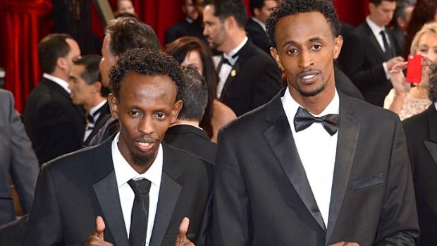 Actors Barkhad Abdi, left, and Faysal Ahmed at the Oscars ceremony.