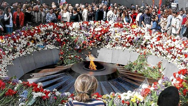 Armenians lay flowers at the Genocide Memorial in Yerevan. Professor Justin McCarthy's views on the   genocide, in which more than one million people are believed to have died at the hands of the Ottoman Empire between 1915 and 1923, have made him a controversial figure.