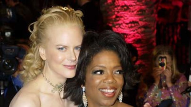 Oprah with Nicole Kidman at the Vanity Fair Oscar Party in 2004.