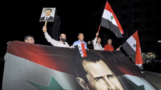 Divided ... many Syrians strongly support Dr Assad.