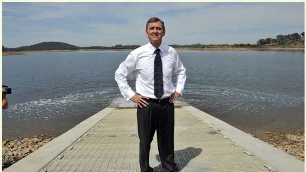 Water flows underneath Premier John Brumby after he started pumping water out of the Goulburn River into Sugarloaf Reservoir via the North South pipeline in February.