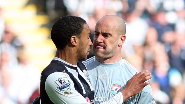 Close-up: Pepe Reina, right, and James Perch clash.