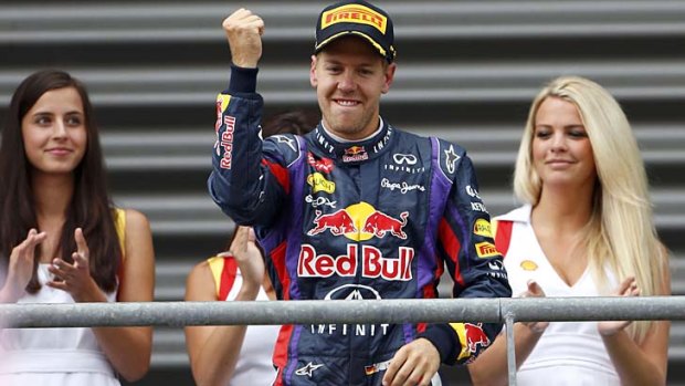Red Bull Formula One driver Sebastian Vettel of Germany celebrates after winning the Belgian F1 Grand Prix on Sunday.