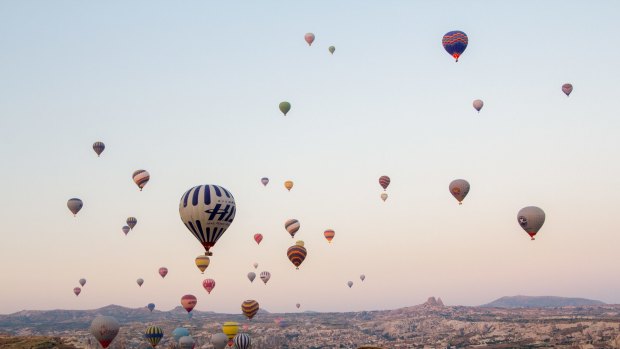 The skies above Cappadocia are filled with hot air balloons.