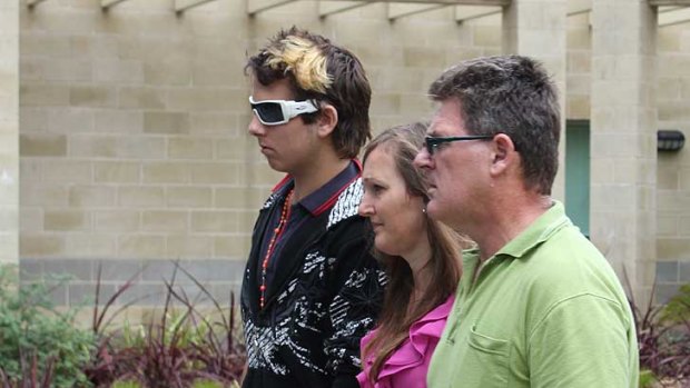 Jessie Cate's boyfriend Harley Murphy (left), mother Judy Cate and uncle Ric Troode at the Mandurah police station.