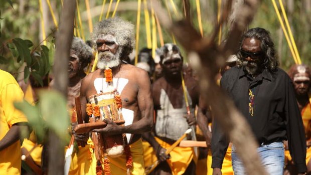 Colourful tribute: Mourners at the service for Yunupingu.