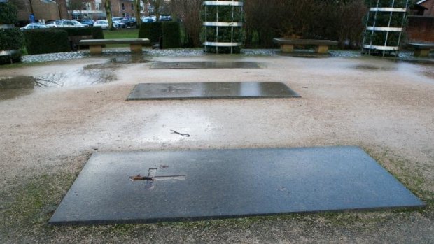 Three graves stones mark the site where Hyde Abbey once stood in Winchester, England. It is believed King Alfred's bones were moved here after his death.