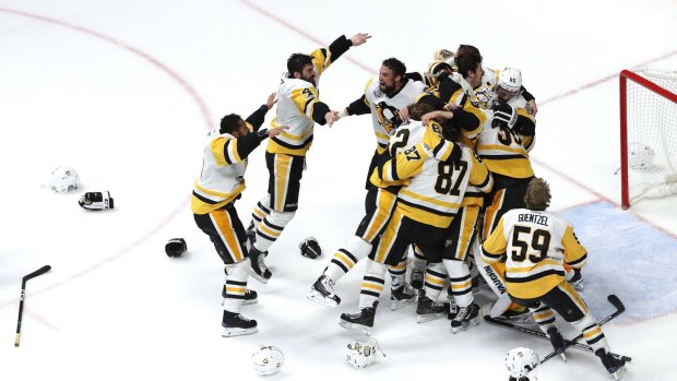 Matt Murray of the Pittsburgh Penguins celebrates with teammates after they defeated the Nashville Predators 2-0 to win the 2017 NHL Stanley Cup Final.
