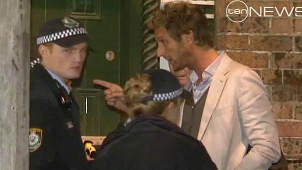Had his pub robbed ... Justin Hemmes argues with police.