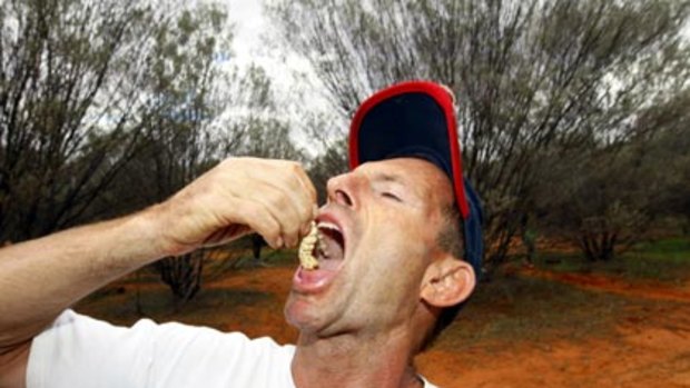From frontbench to outback ... Tony Abbott proves politics is a grubby business.