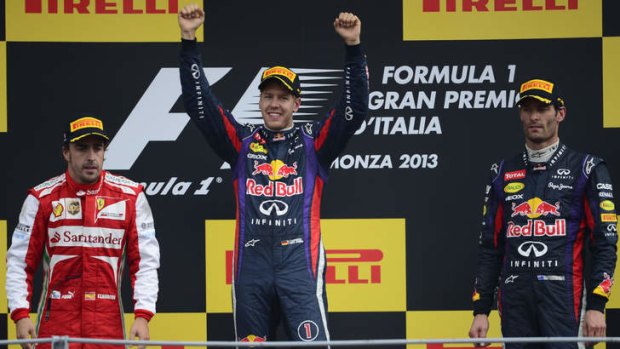 Podium finish: Australia's Mark Webber (right) third behind winner Sebastian Vettel and Fernando Alonso.
