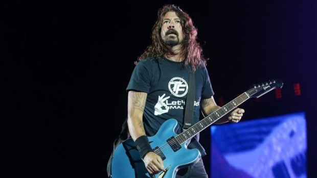 Charismatic frontman Dave Grohl leads the Foo Fighters through their set at Suncorp Stadium.