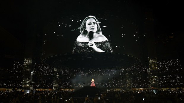 Adele, performing at Etihad Stadium, felt compelled to point out her big-screen image had some flattering filters on it.