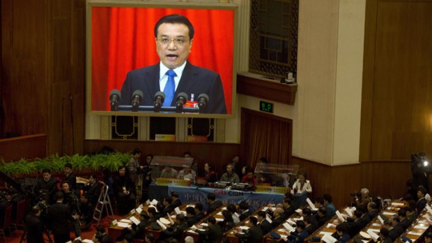 Chinese Premier Li Keqiang delivers a work report during the opening session of the annual National People's Congress in Beijing's Great Hall of the People.