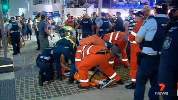 Emergency services rush to the aid of the teenager king-hit in Cavill Mall. Photo: Seven News